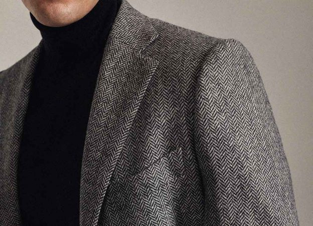 La veste en tweed à chevrons gris noir